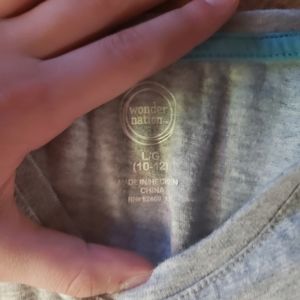 Grey shirt with rainbow tidied hearts